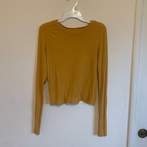 Small Yellow long sleeve crop warn a few times